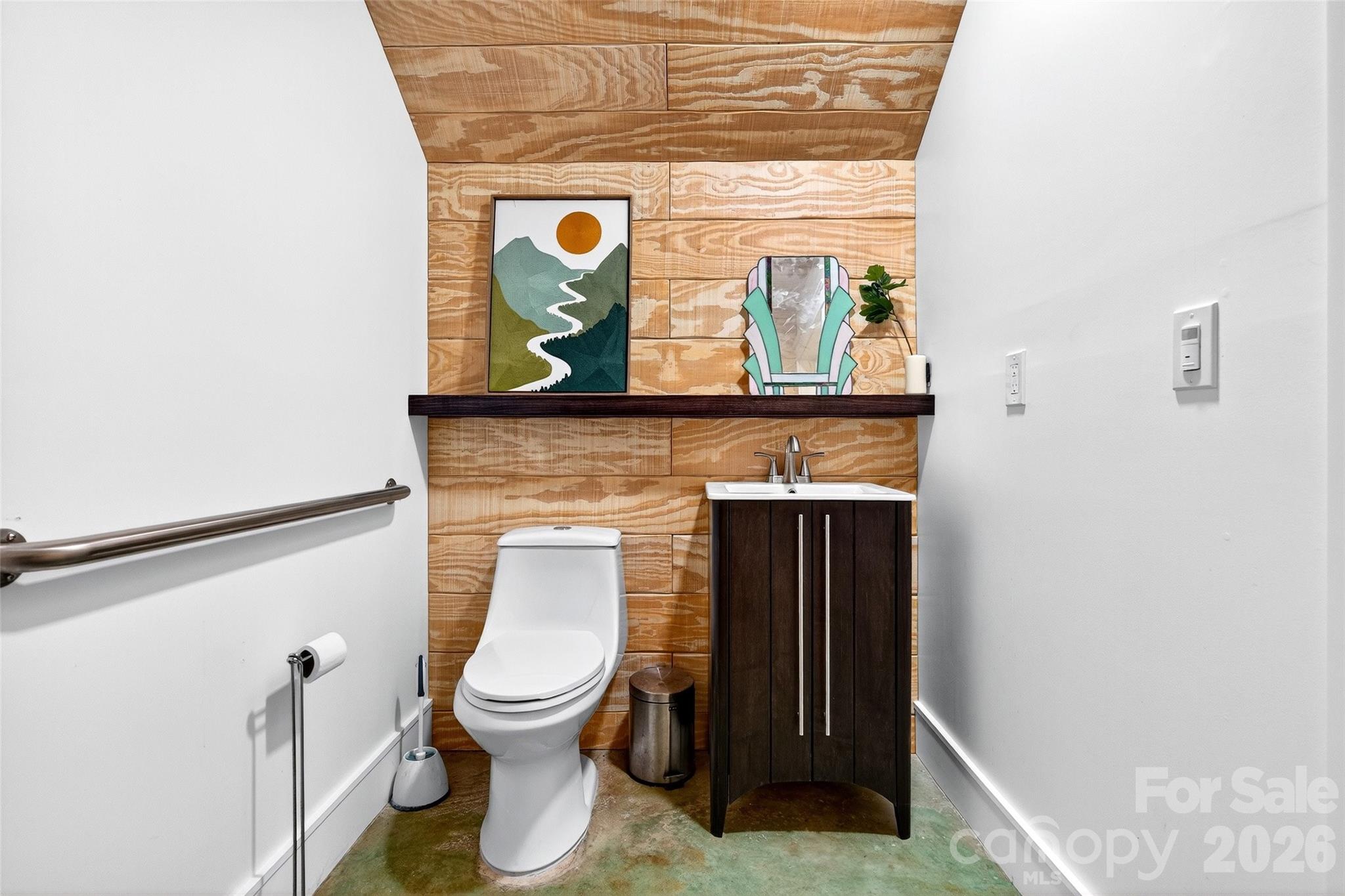 626 Old Lytle Cove Road Swannanoa, NC 28778 - Photo 13 of 48 a bathroom with a toilet and a sink
