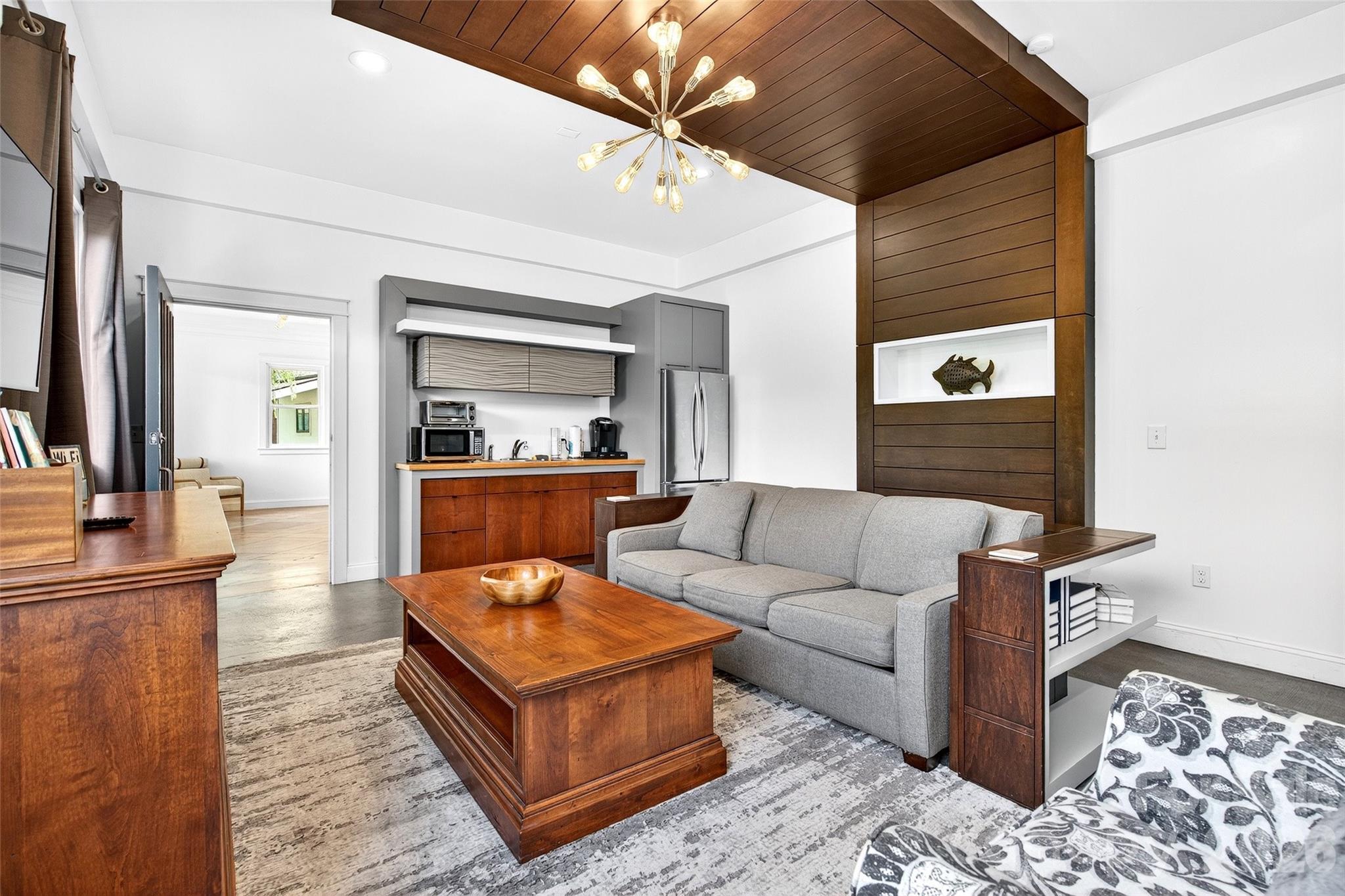 626 Old Lytle Cove Road Swannanoa, NC 28778 - Photo 16 of 48 a living room with furniture and a flat screen tv