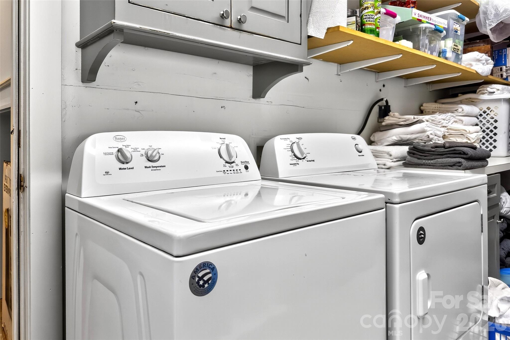 626 Old Lytle Cove Road Swannanoa, NC 28778 - Photo 24 of 48 a utility room with dryer and washer
