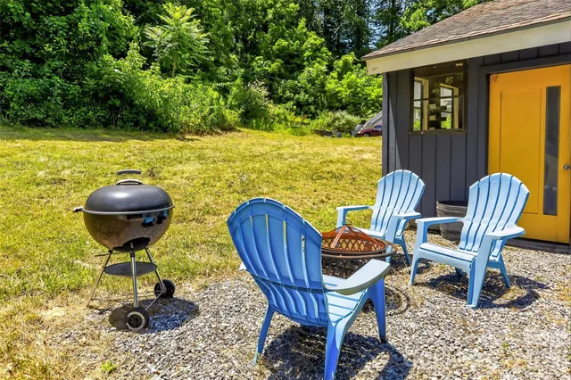 a view of a balcony with wooden floor