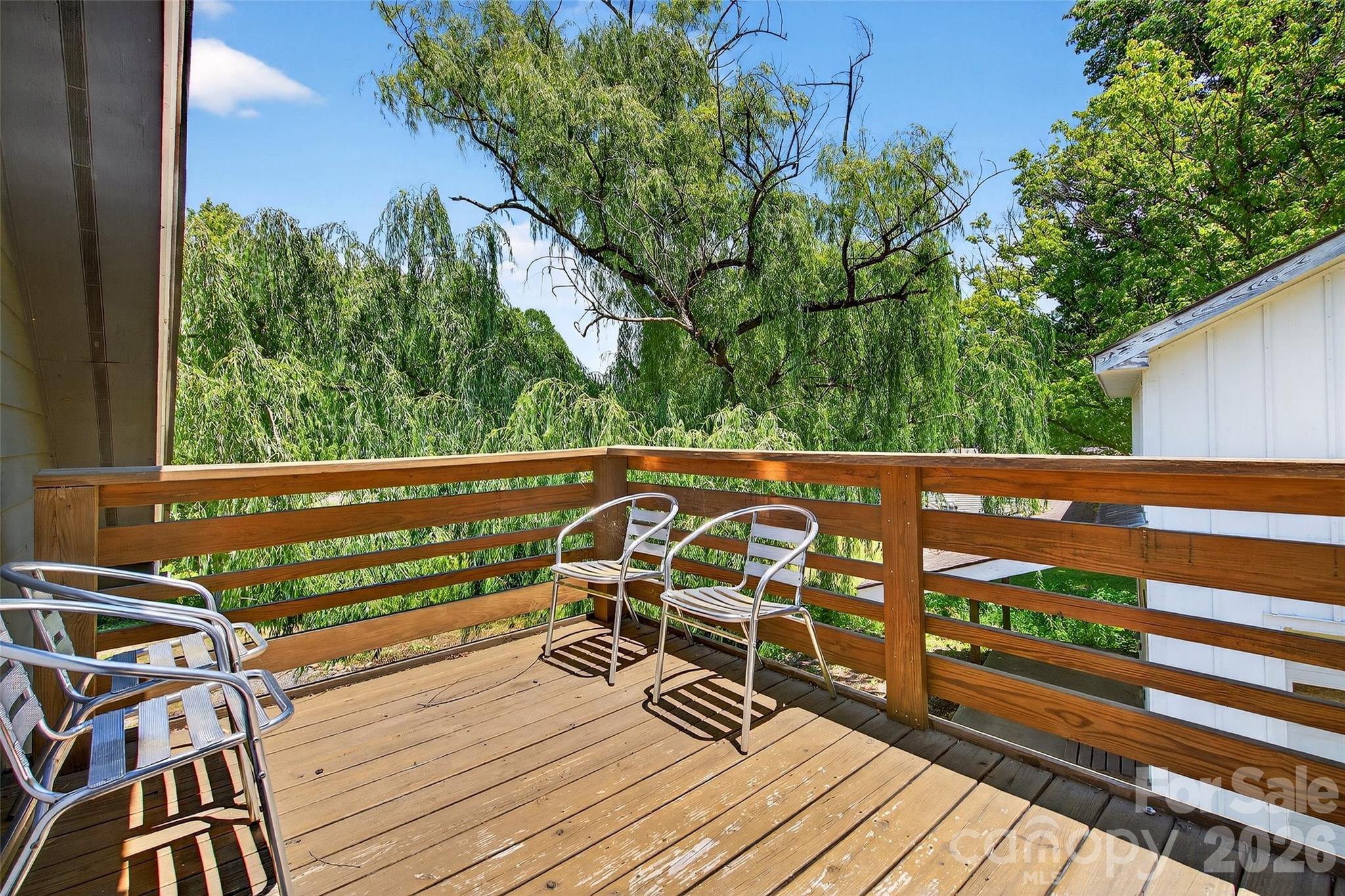 626 Old Lytle Cove Road Swannanoa, NC 28778 - Photo 29 of 48 a view of a balcony with wooden floor