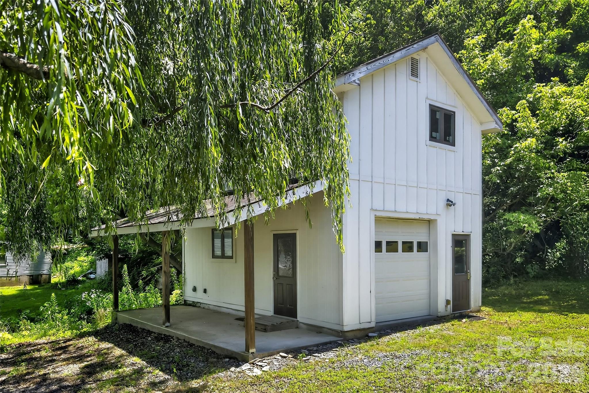 626 Old Lytle Cove Road Swannanoa, NC 28778 - Photo 43 of 48 a front view of house with yard