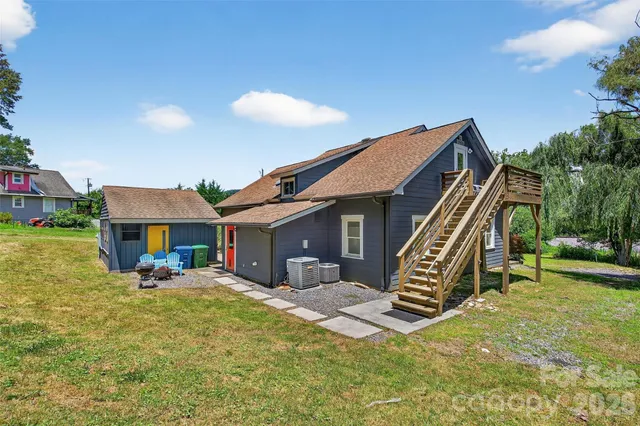 a view of a house with outdoor seating area