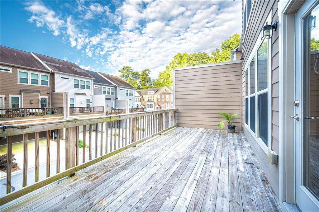 2166 Rock Creek Park Decatur, GA 30033 - Photo 20 of 40 a view of a wooden deck with a yard