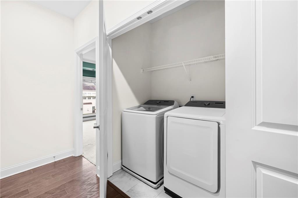 2166 Rock Creek Park Decatur, GA 30033 - Photo 21 of 40 a view of storage and utility room with washer and dryer