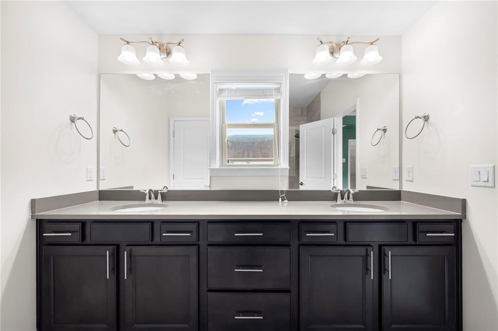2166 Rock Creek Park Decatur, GA 30033 - Photo 29 of 40 a bathroom with a sink and a mirror