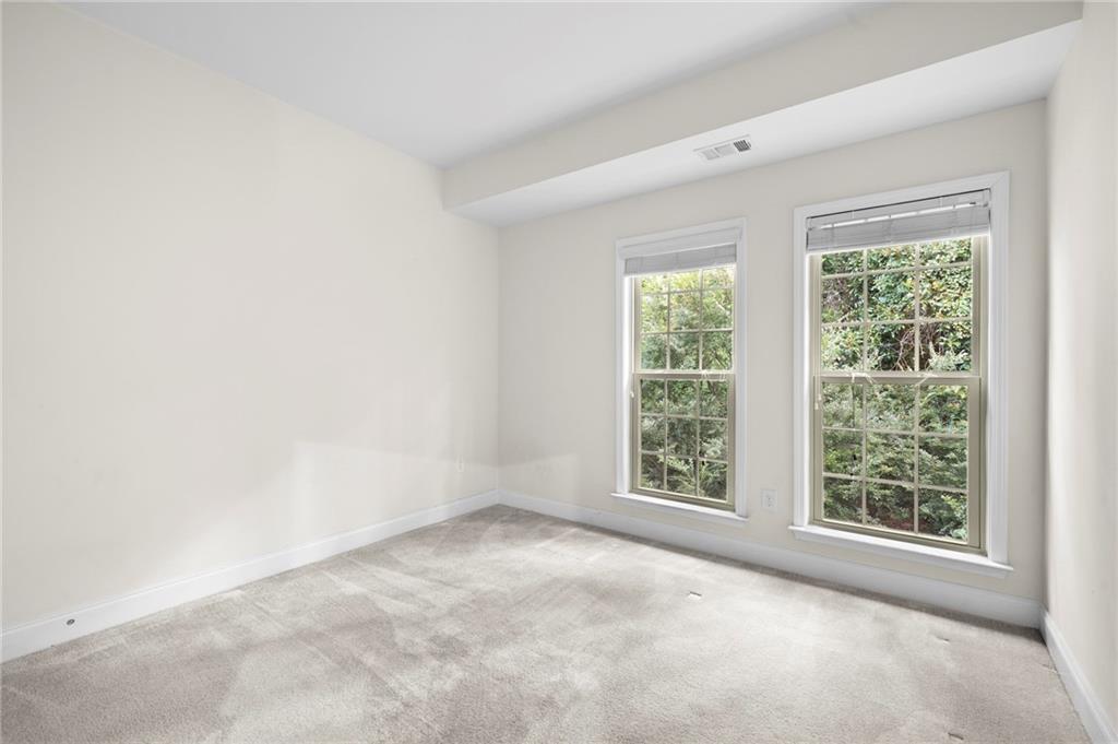 2166 Rock Creek Park Decatur, GA 30033 - Photo 33 of 40 an empty room with windows