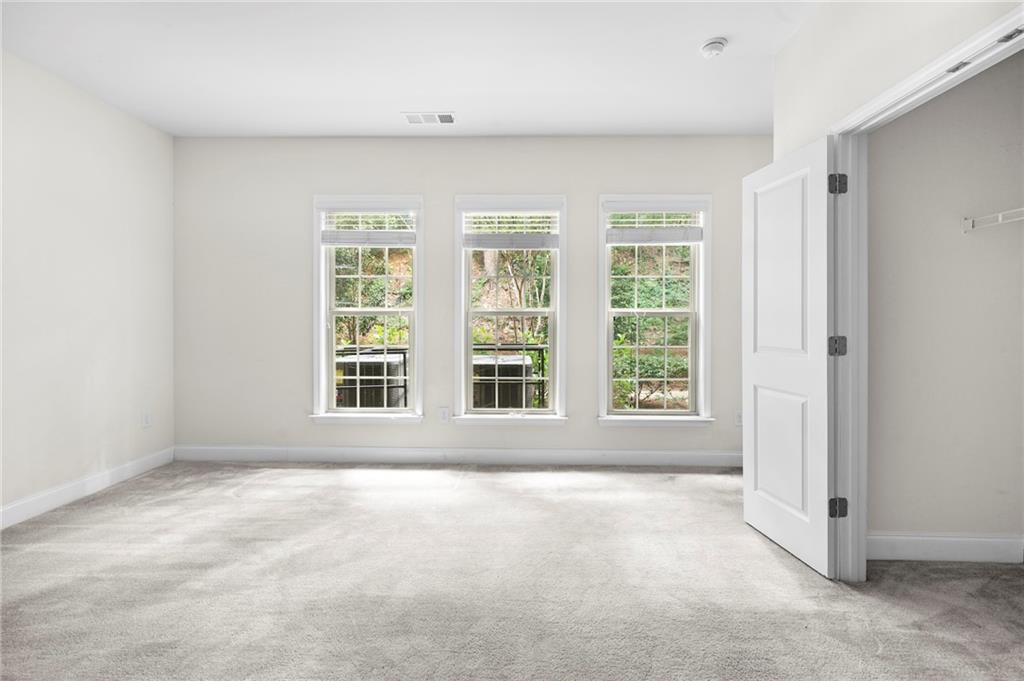 2166 Rock Creek Park Decatur, GA 30033 - Photo 36 of 40 a view of an empty room with a window