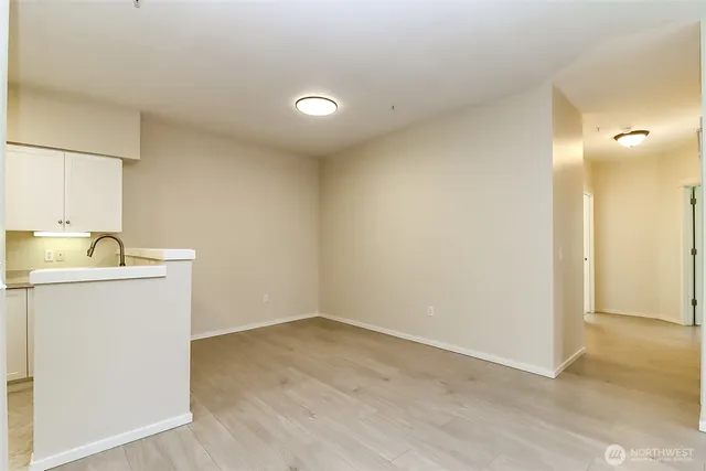 a view of a storage & utility room with a sink