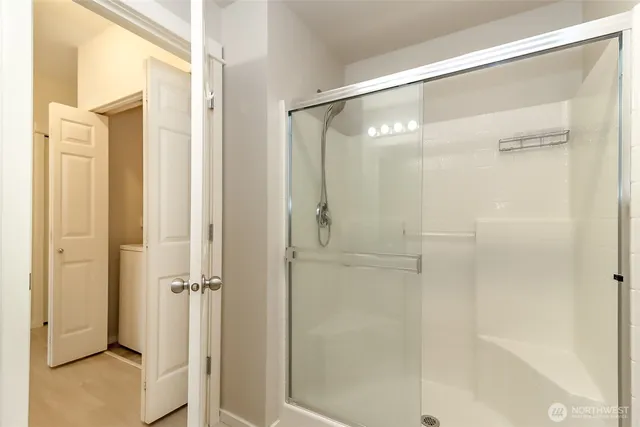 a view of a room with a hallway