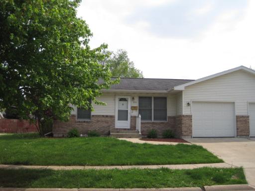330 9th Avenue, Unit 330 Rochelle, IL 61068 - Photo 1 of 13 front view of a house with a yard