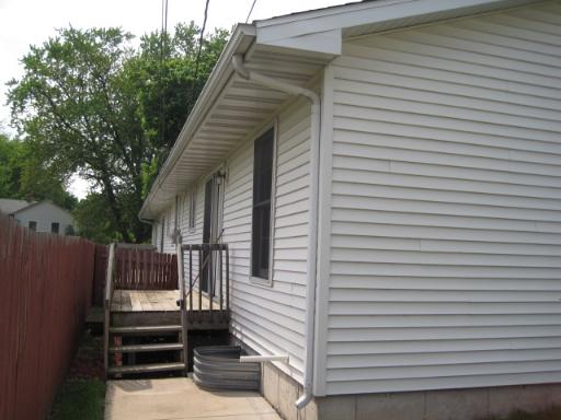330 9th Avenue, Unit 330 Rochelle, IL 61068 - Photo 2 of 13 a view of a house with a door and wooden floor