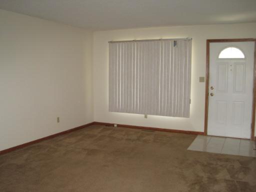 330 9th Avenue, Unit 330 Rochelle, IL 61068 - Photo 8 of 13 an empty room with closet area