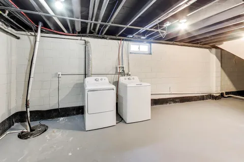 a view of a storage room with washer and dryer