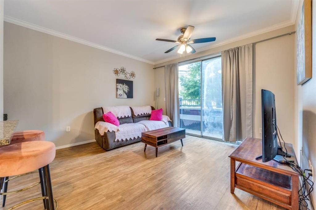330 Las Colinas Boulevard East, Unit 140 Irving, TX 75039 - Photo 14 of 14 a living room with furniture and a window