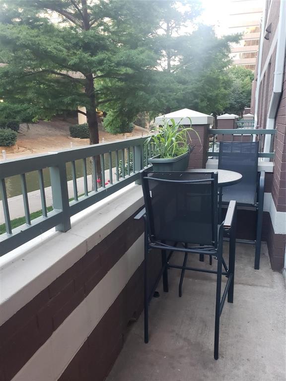 330 Las Colinas Boulevard East, Unit 140 Irving, TX 75039 - Photo 9 of 14 a view of a chairs and table in the balcony