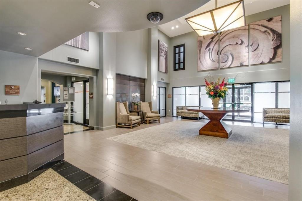 330 Las Colinas Boulevard East, Unit 140 Irving, TX 75039 - Photo 10 of 14 a living room with furniture and a large window