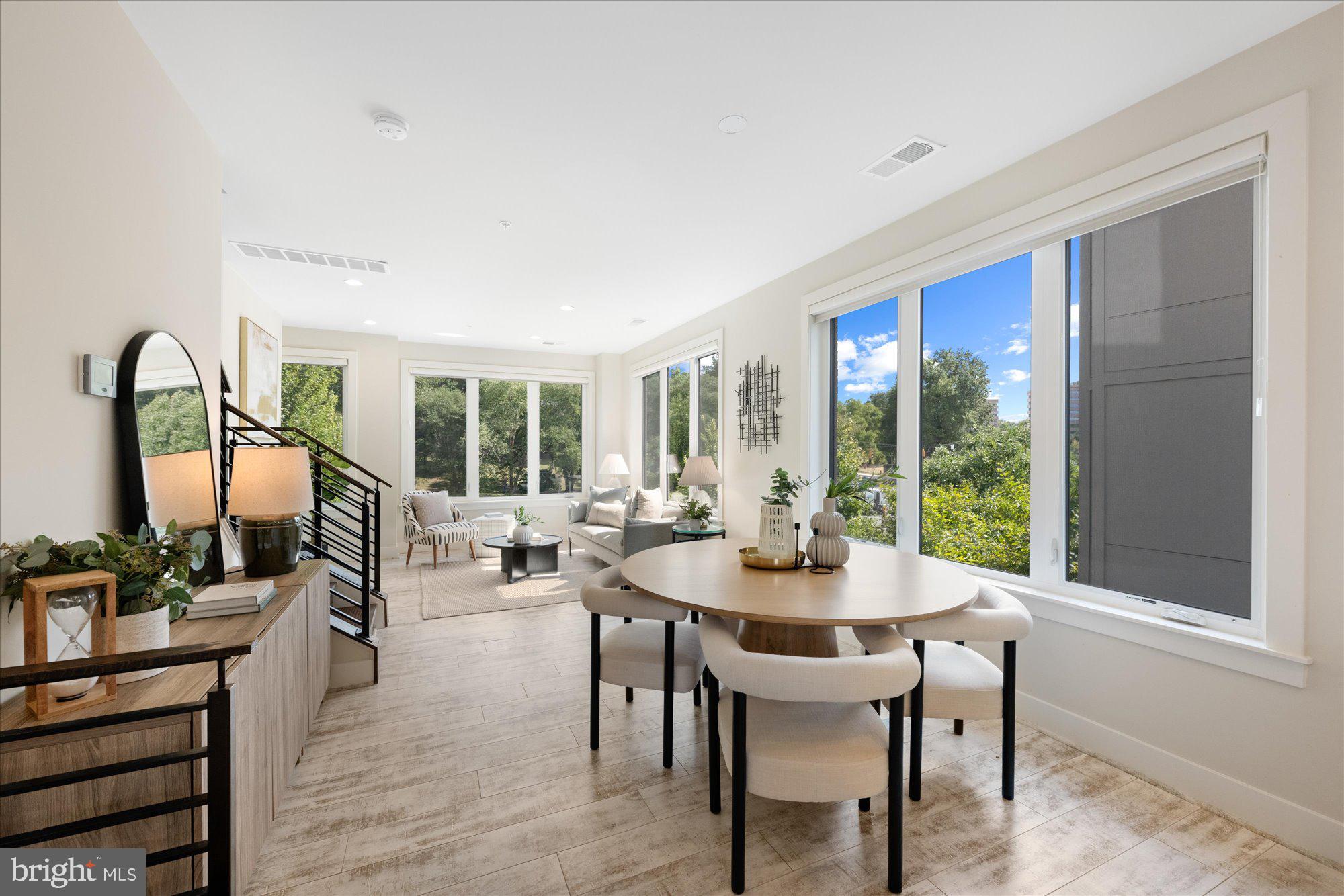6597 Rock Spring Drive Bethesda, MD 20817 - Photo 17 of 37 a view of a dining room with furniture window and outside view