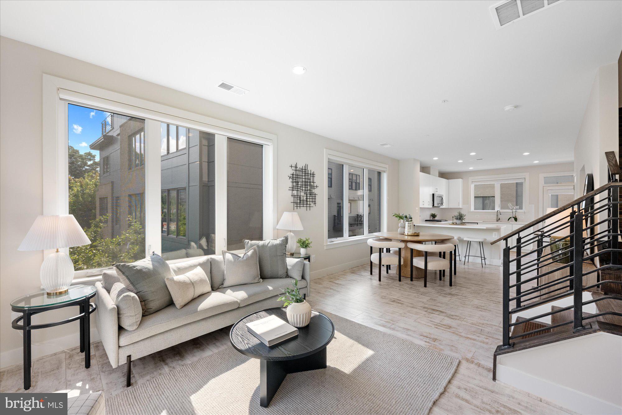 6597 Rock Spring Drive Bethesda, MD 20817 - Photo 22 of 37 a living room with furniture and a table