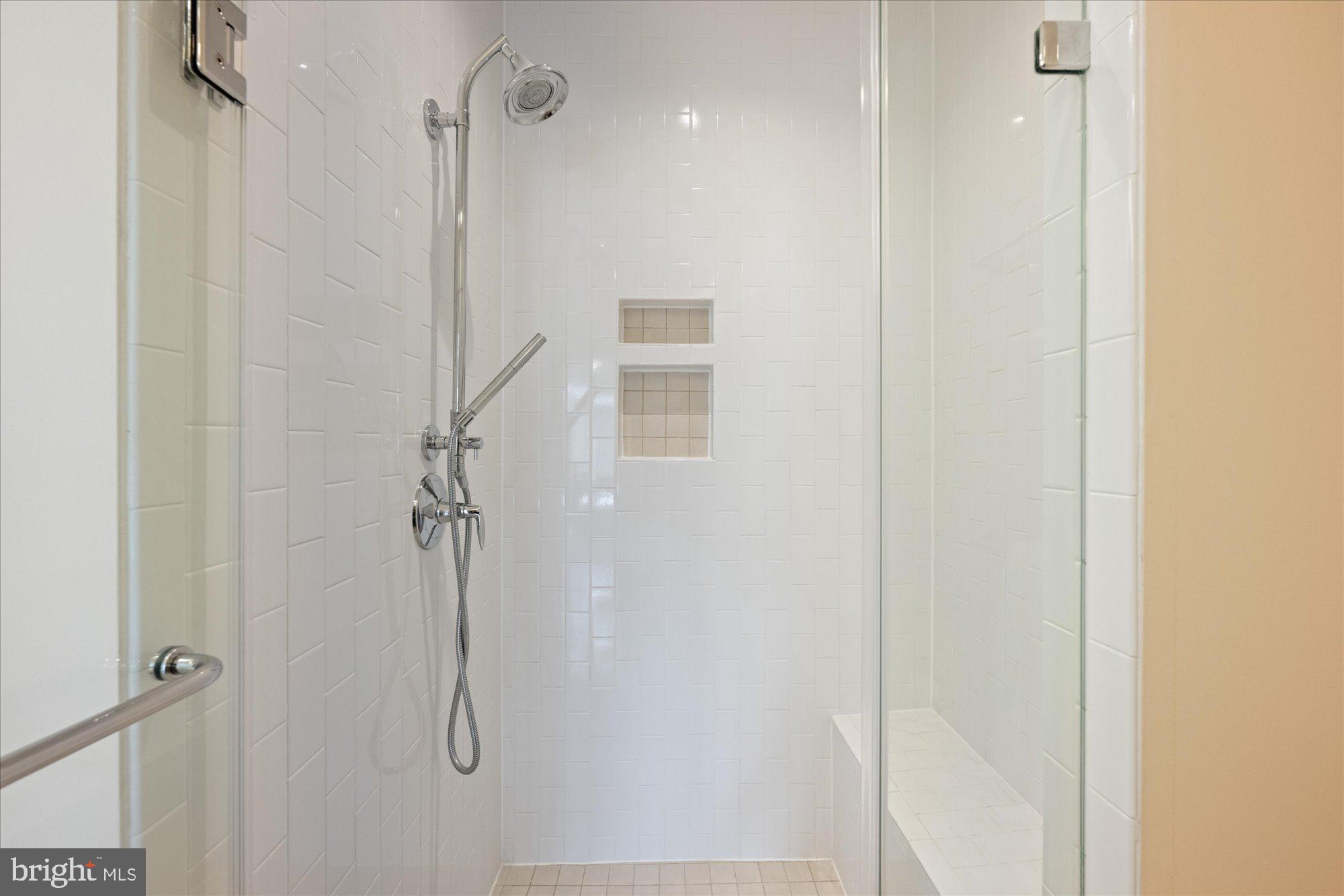 6597 Rock Spring Drive Bethesda, MD 20817 - Photo 26 of 37 a bathroom with a shower