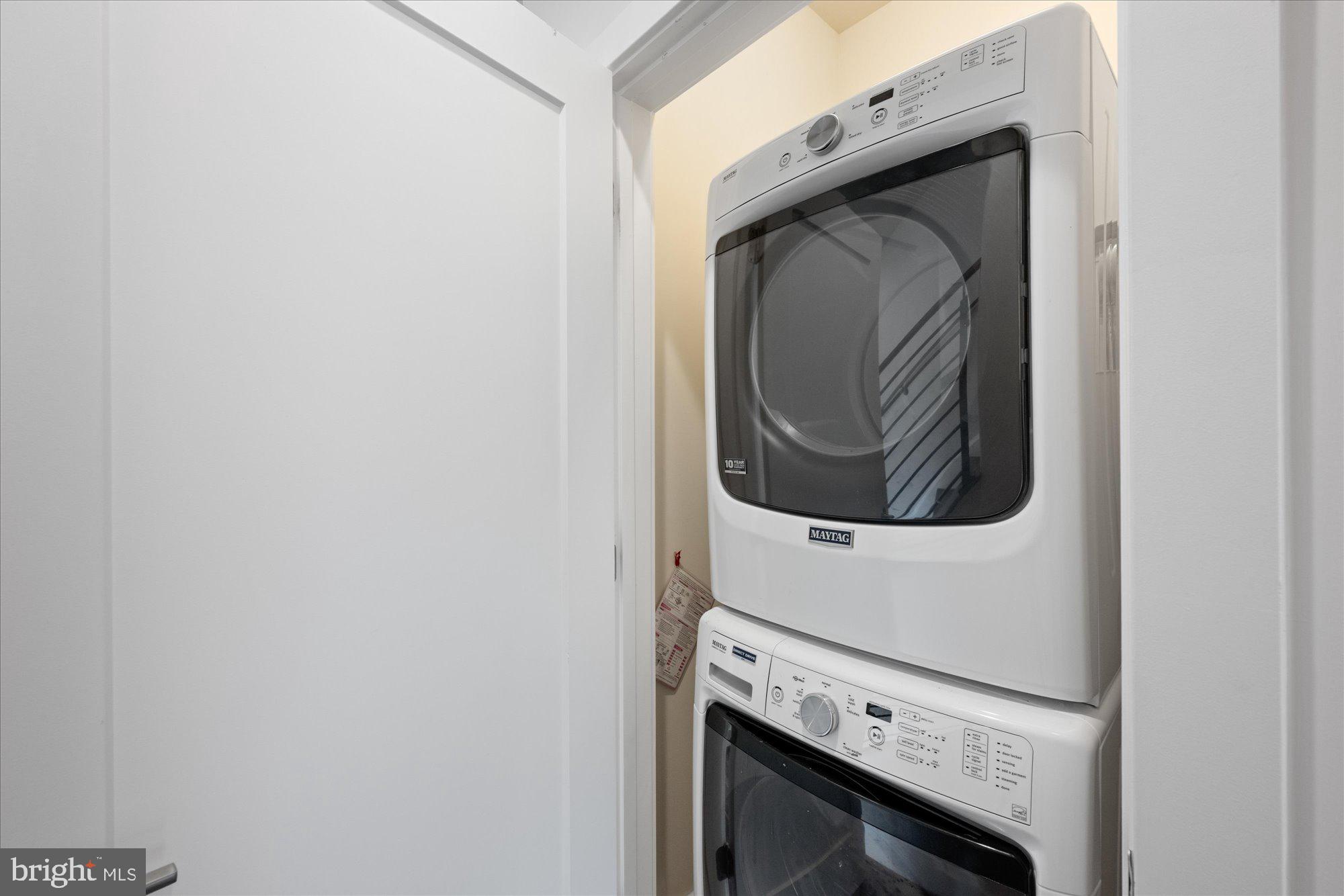 6597 Rock Spring Drive Bethesda, MD 20817 - Photo 27 of 37 a close up view of a washer and dryer