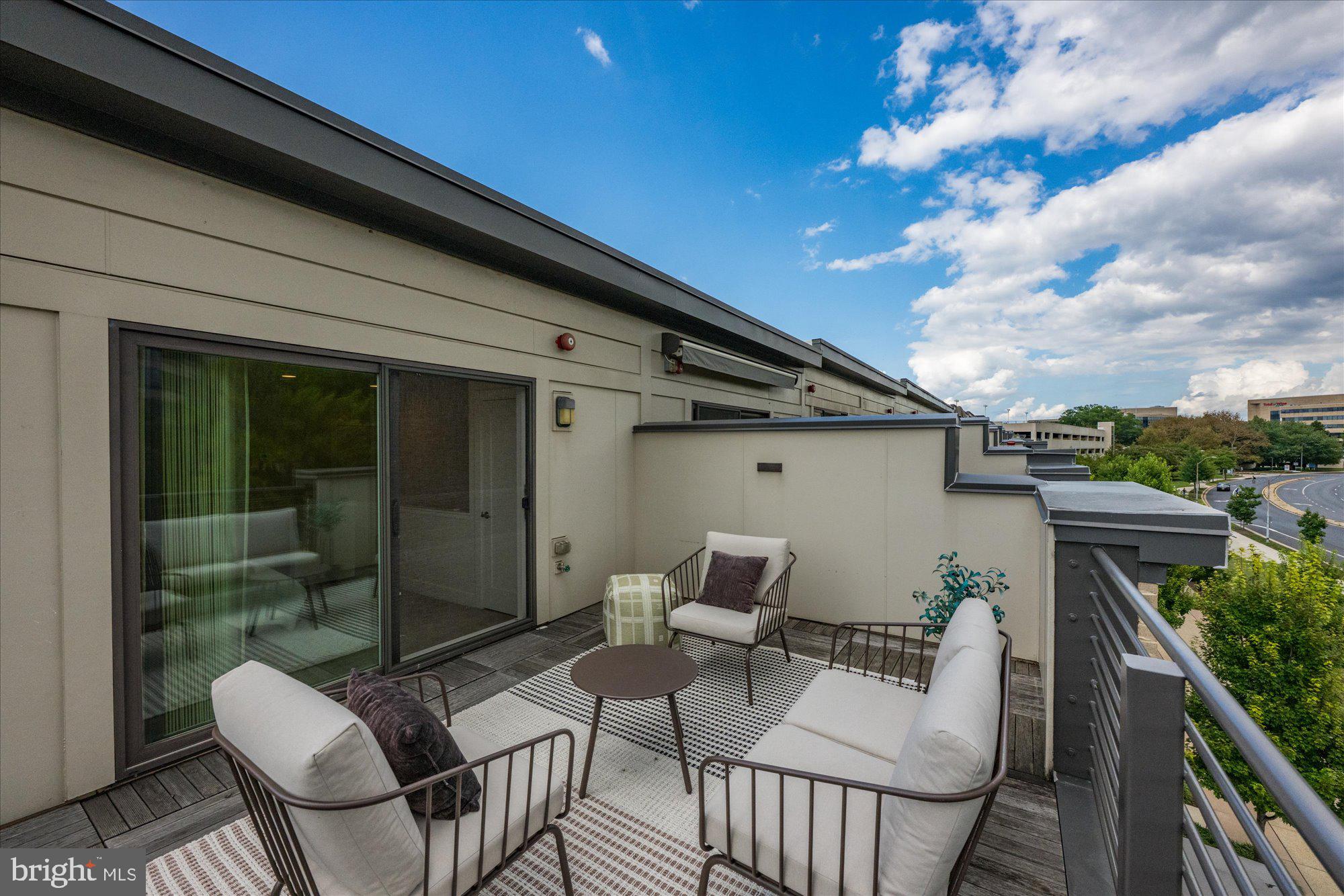 6597 Rock Spring Drive Bethesda, MD 20817 - Photo 36 of 37 a view of balcony with furniture