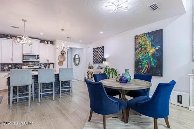 a close view of a utility room with washer and dryer