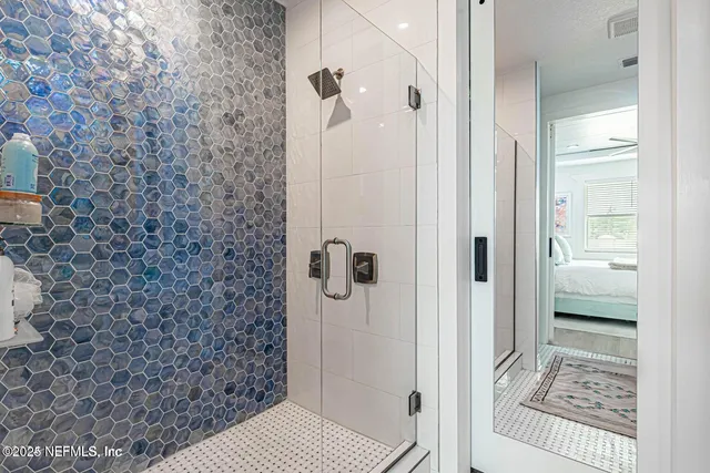 a room with toys and white kitchen