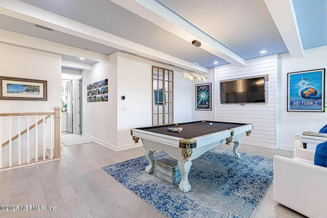 a bed room with a bed and a lamp