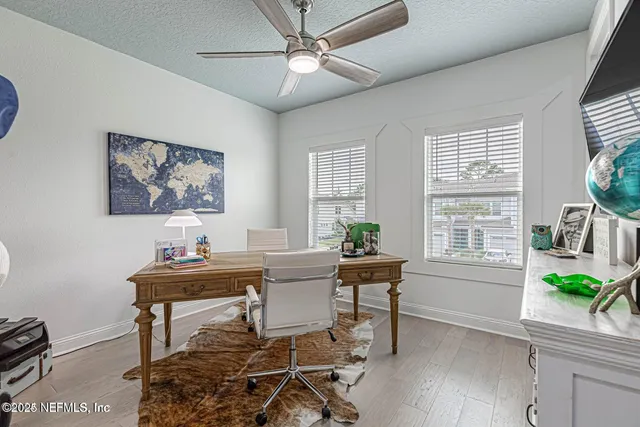 a bathroom with a sink toilet and a mirror