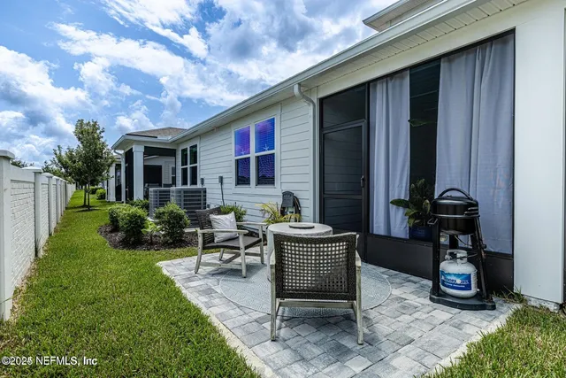 a view of a chair and table on the terrace