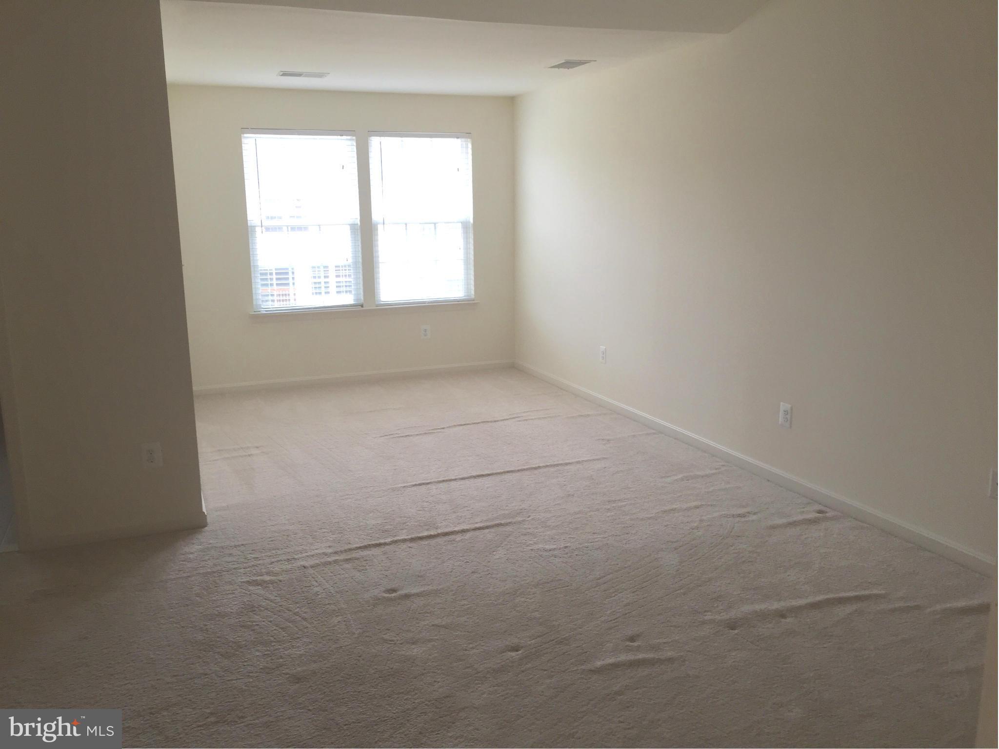 26 Riparian Lane Ranson, WV 25438 - Photo 12 of 28 an empty room with a window