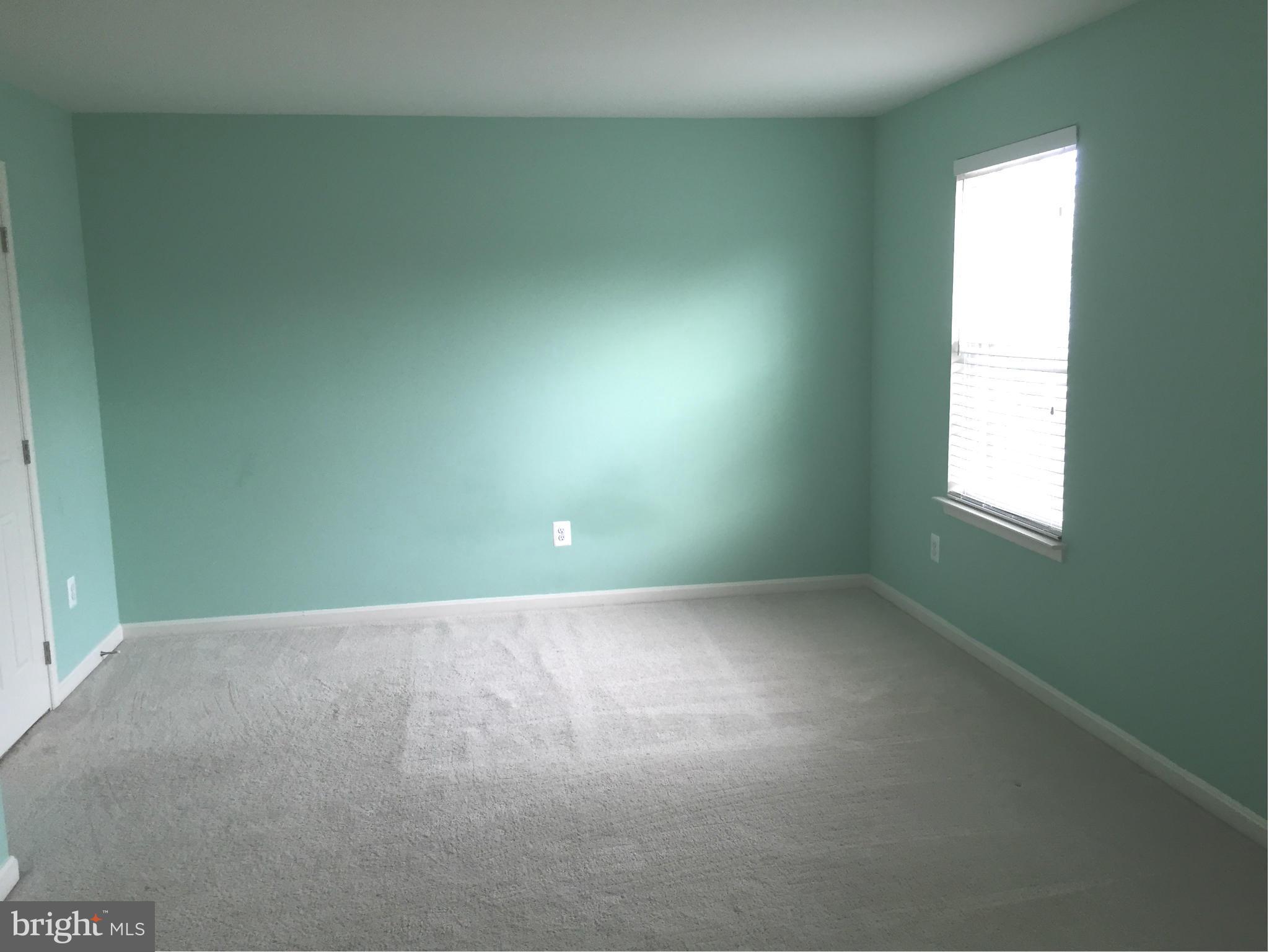 26 Riparian Lane Ranson, WV 25438 - Photo 14 of 28 a view of an empty room with a window