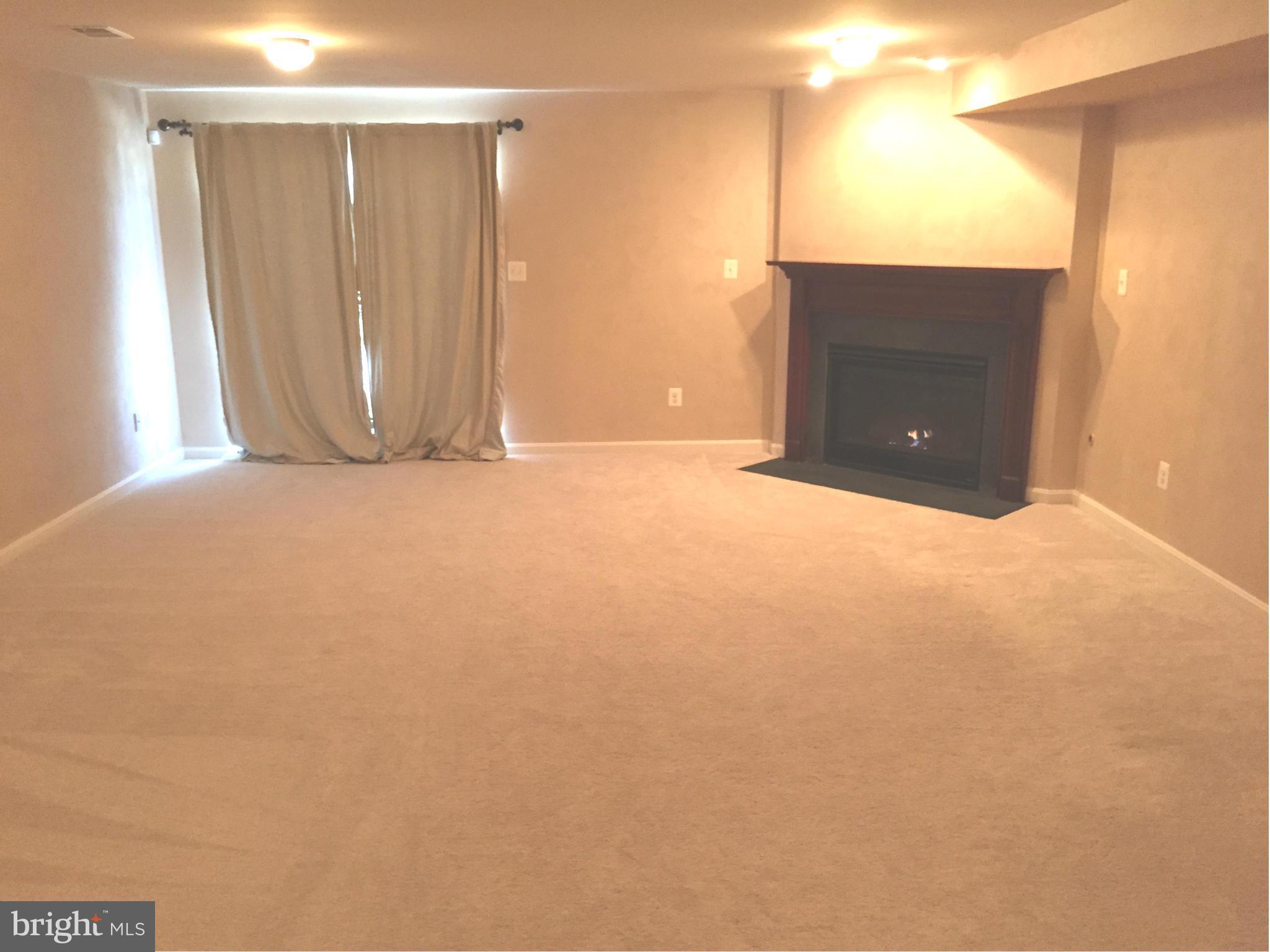 26 Riparian Lane Ranson, WV 25438 - Photo 20 of 28 a view of a livingroom with an empty space and a window