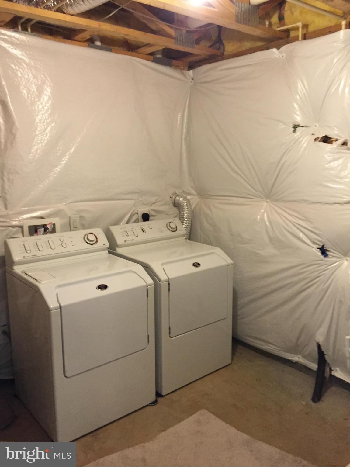 26 Riparian Lane Ranson, WV 25438 - Photo 25 of 28 a utility room with dryer and washer