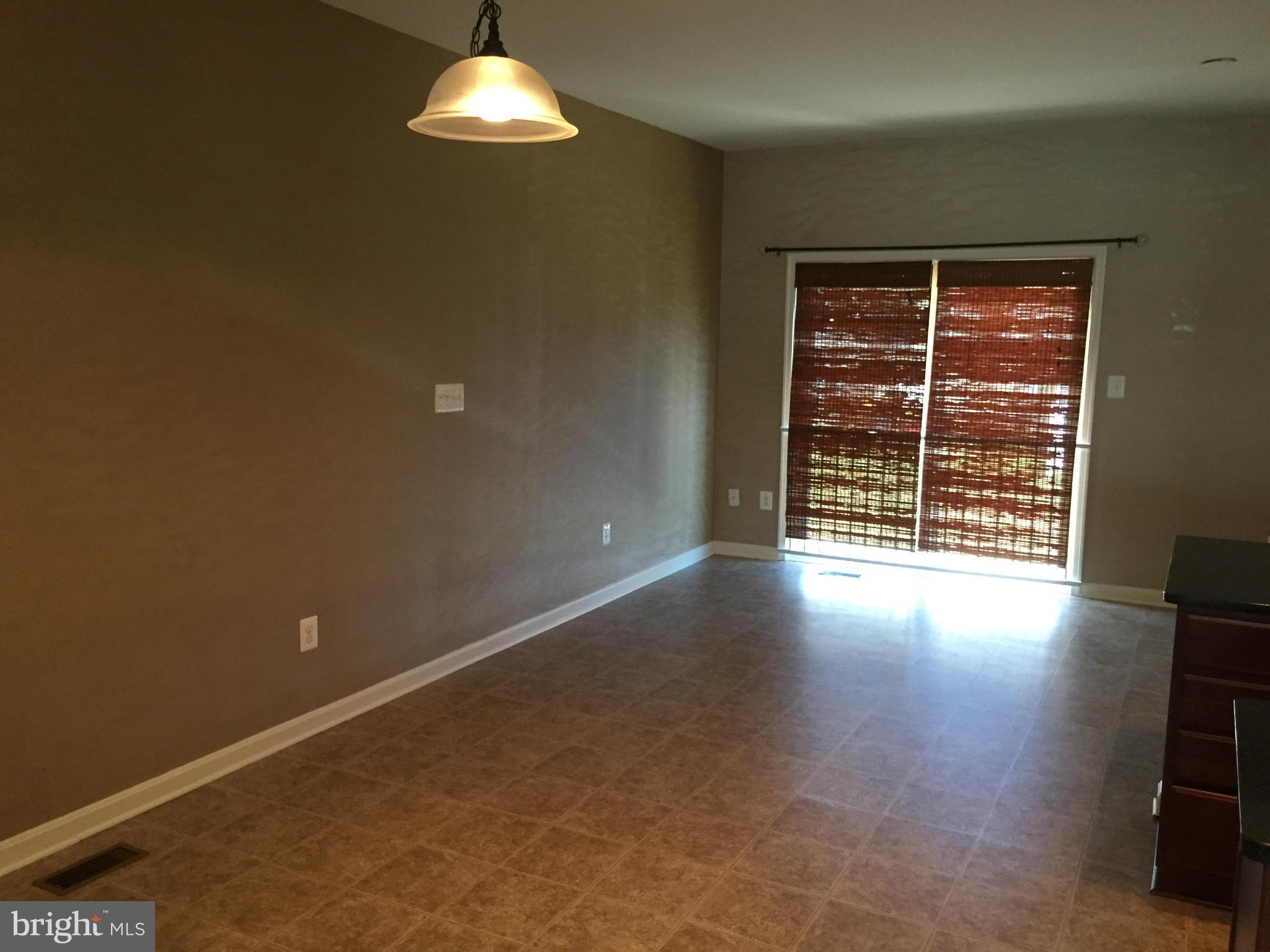 26 Riparian Lane Ranson, WV 25438 - Photo 6 of 28 a view of an empty room with a window