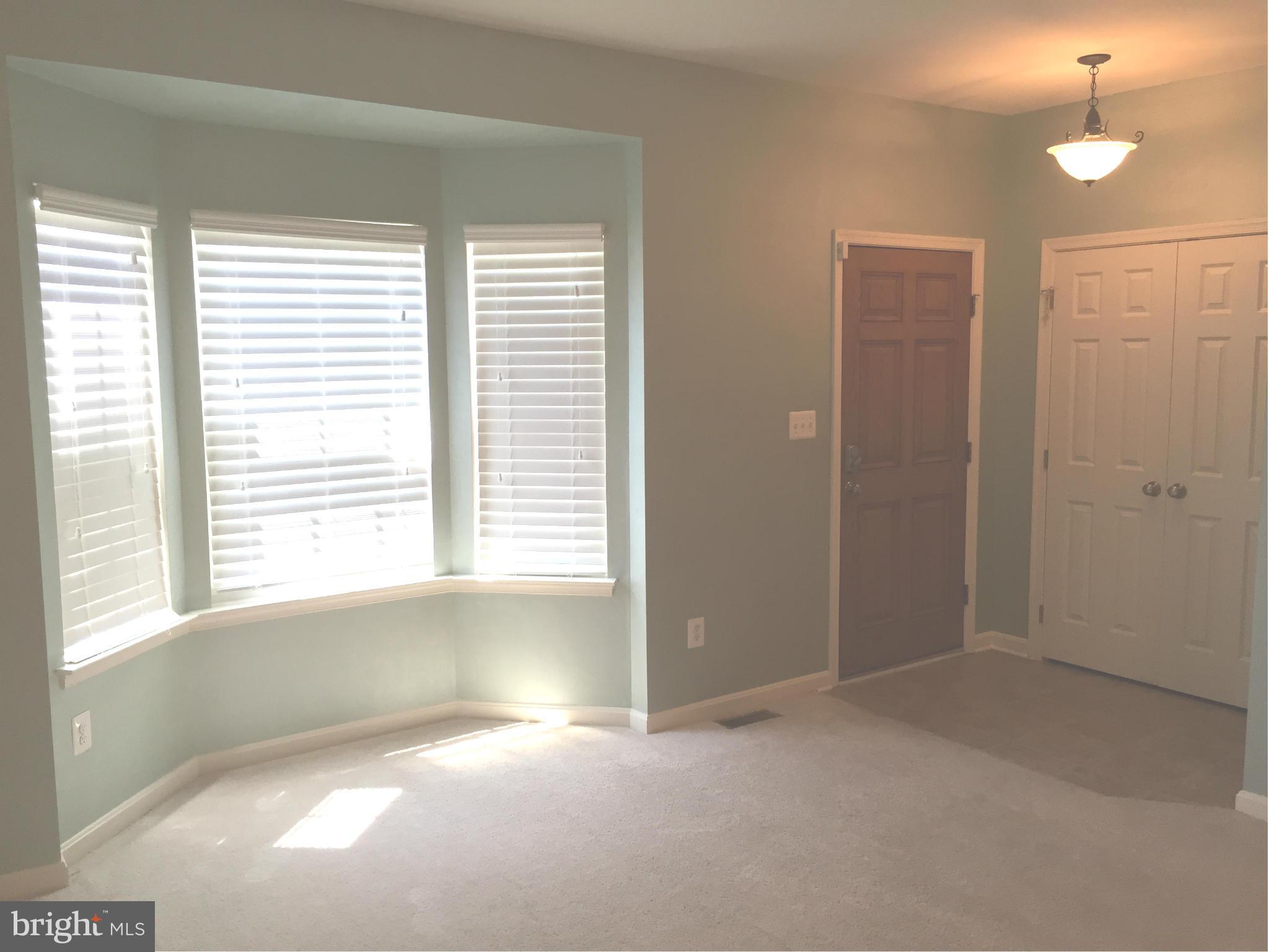 26 Riparian Lane Ranson, WV 25438 - Photo 10 of 28 a view of an empty room with a window