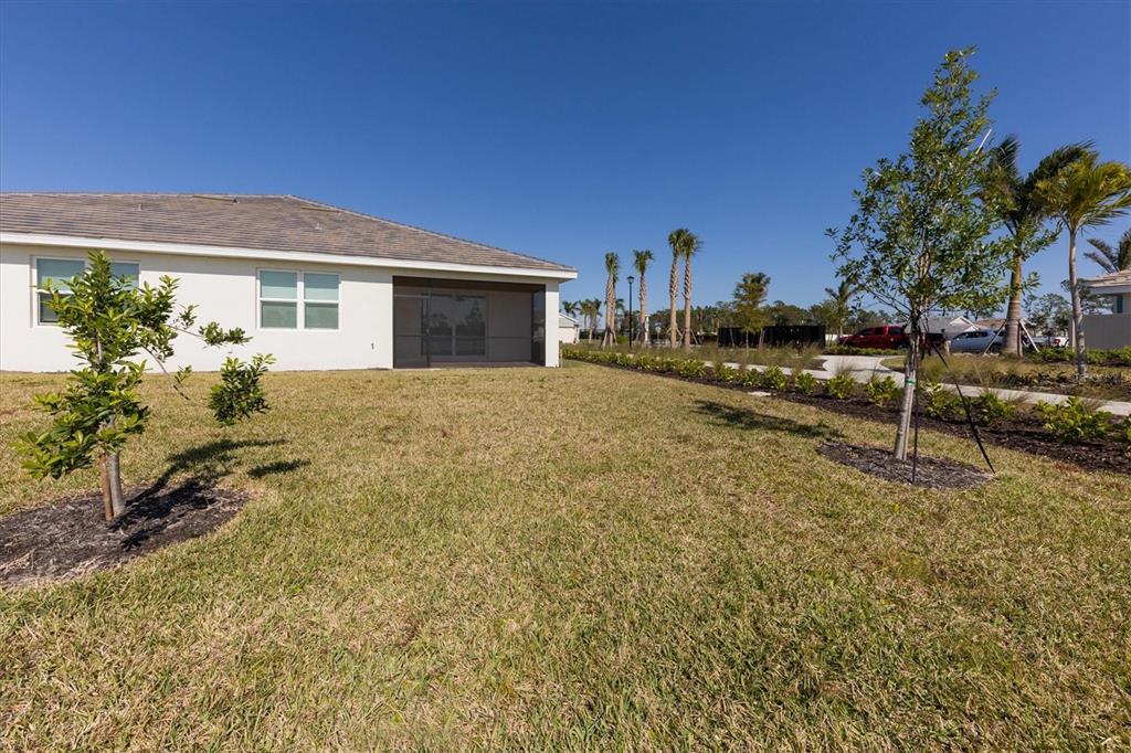 111 Ibiza Loop Venice, FL 34292 - Photo 31 of 37 a view of a house with a garden