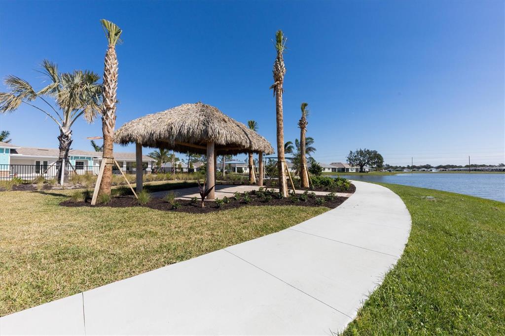 111 Ibiza Loop Venice, FL 34292 - Photo 36 of 37 a view of a garden with a slide