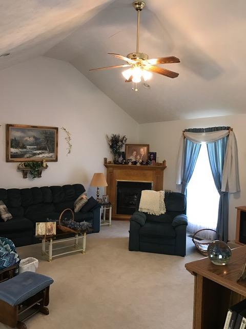 3623 Yager Road McMinnville, TN 37110 - Photo 13 of 16 a living room with furniture and a chandelier