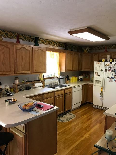 3623 Yager Road McMinnville, TN 37110 - Photo 14 of 16 a kitchen with refrigerator cabinets and a sink