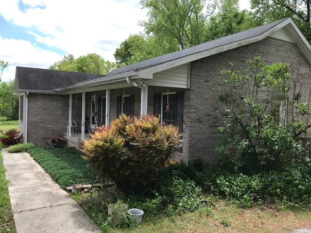 3623 Yager Road McMinnville, TN 37110 - Photo 2 of 16 a front view of house with yard and trees around
