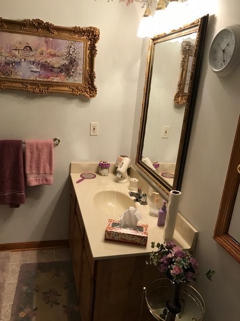 3623 Yager Road McMinnville, TN 37110 - Photo 5 of 16 a bathroom with a sink and mirror