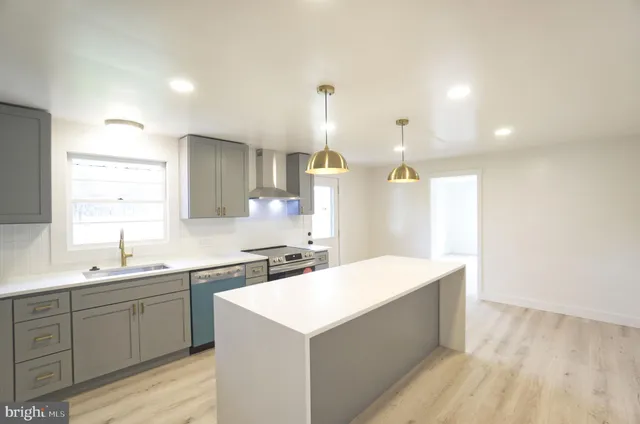 a view of staircase with white walls