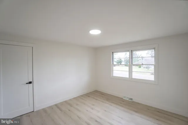 an aerial view of house with yard