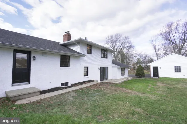 a front view of house with yard