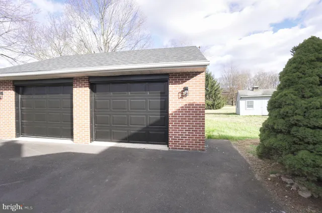 a view of outdoor space and garage