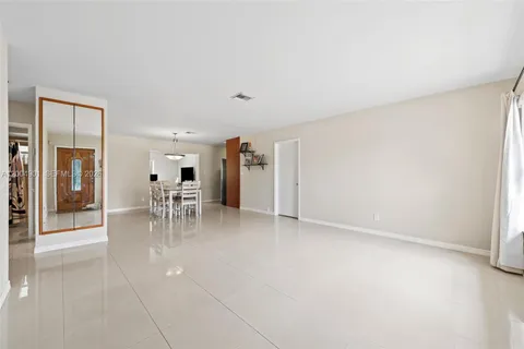 a view of a livingroom with furniture and a table