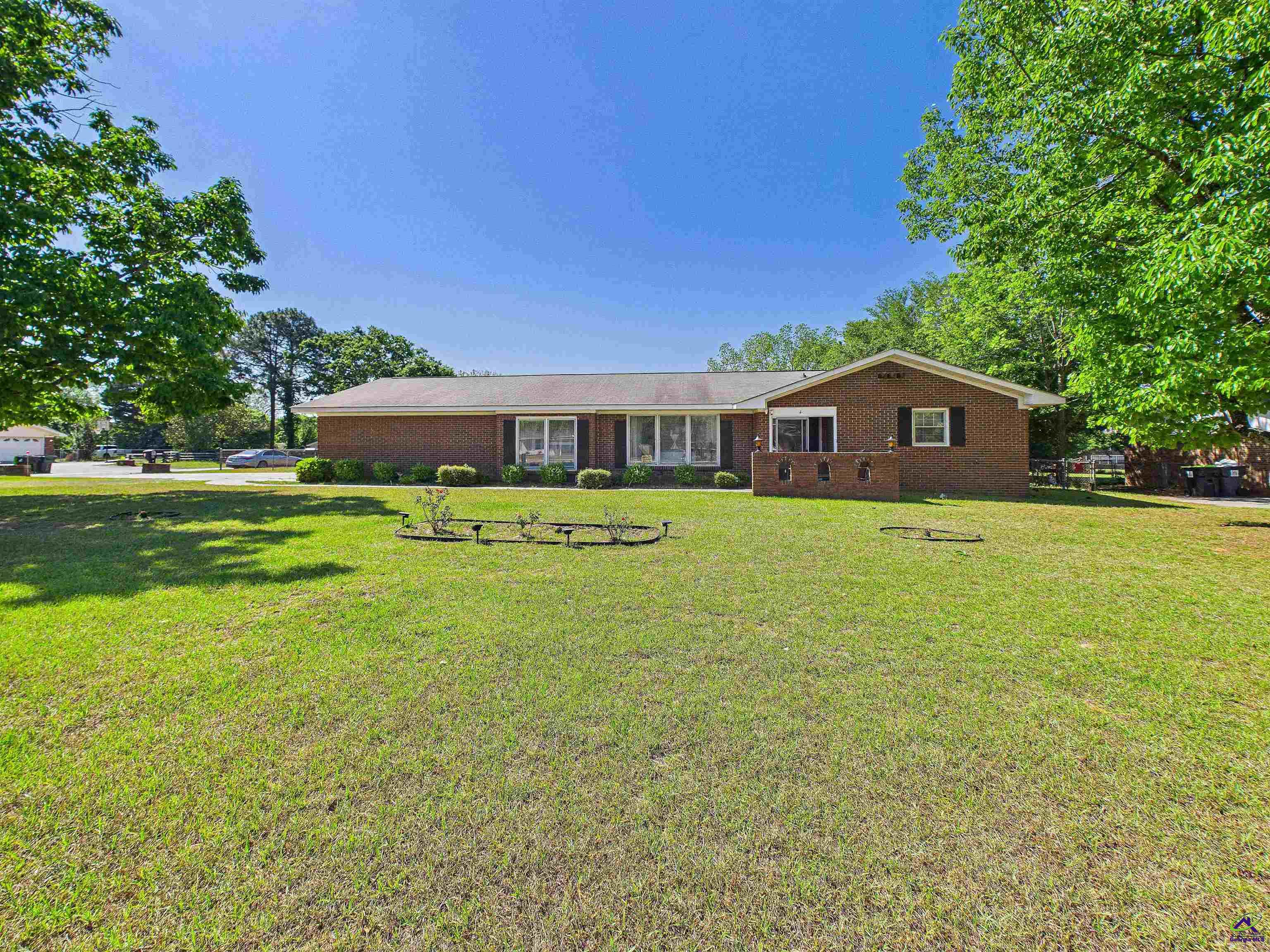 400 Feagin Mill Road Warner Robins, GA 31005 - Photo 8 of 53 a view of a house with a big yard