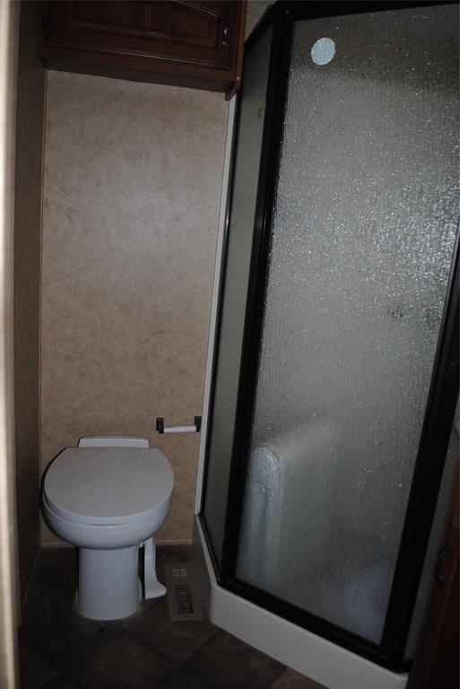 23 Promontory Port Comanche, TX 76442 - Photo 15 of 23 a bathroom with a sink and a toilet